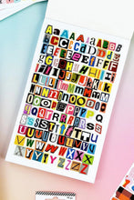 Load image into Gallery viewer, Sheet of colorful alphabet stickers on a gradient background