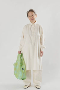 Grandma holding Baggu Mint Pixel Gingham