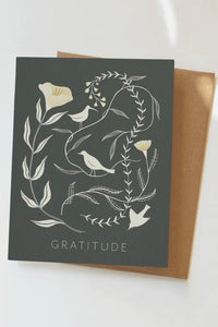 Black card with white birds and flowers and 'Gratitude'