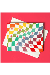 Happy Birthday written in a rainbow checkered board