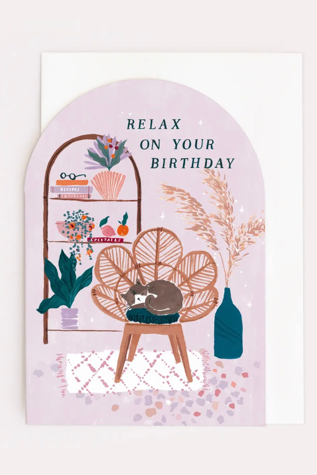 Kitty in ratan chair. Relax on your birthday card