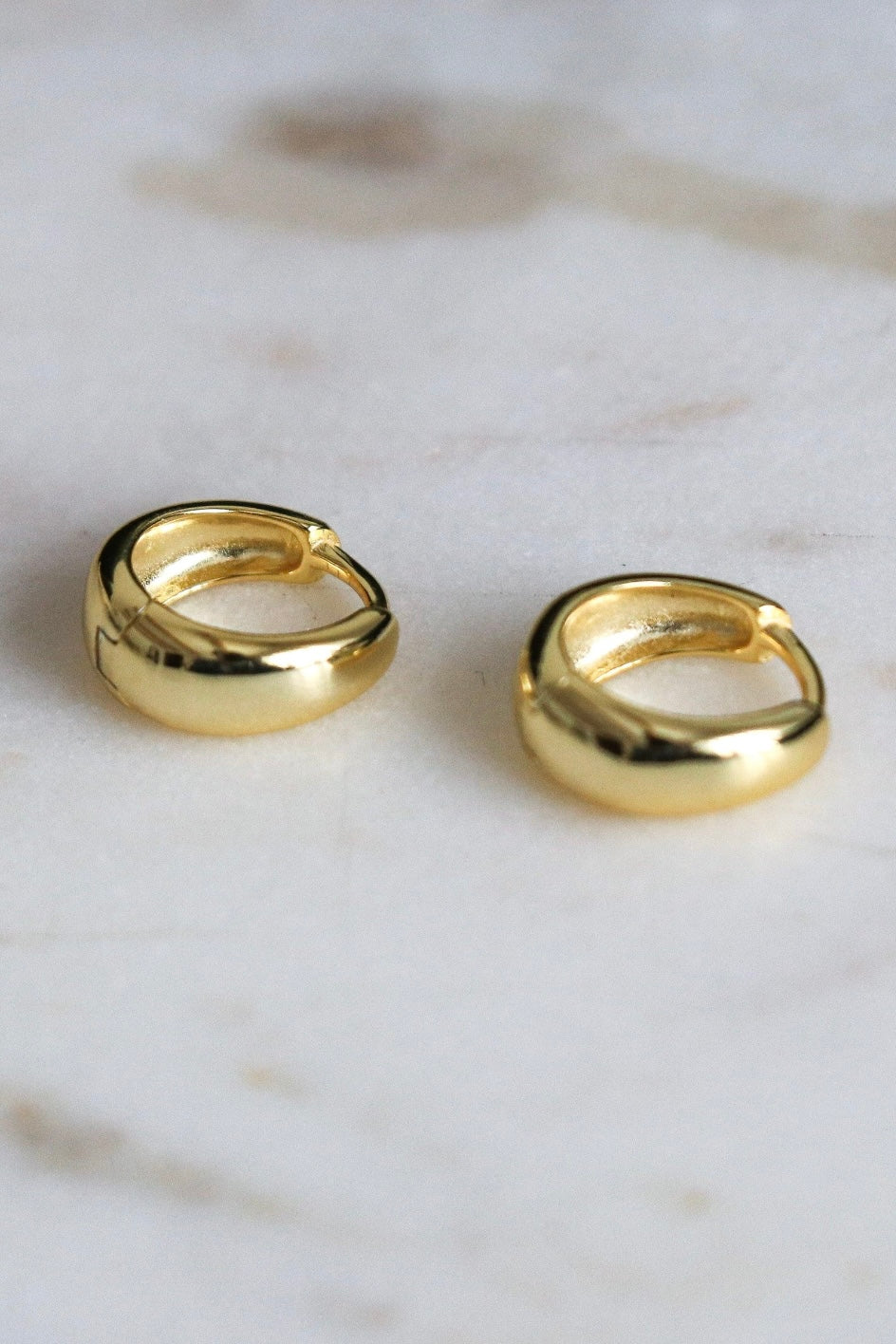 Small, gold huggie hoops