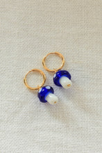 Load image into Gallery viewer, Gold huggie hoops with blue shrooms