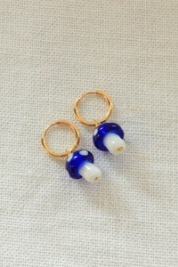 Gold huggie hoops with blue shrooms