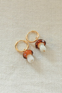 gold huggie hoops with brown shrooms