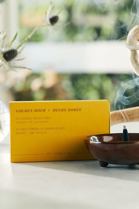 Incense Cones in yellow box packaging
