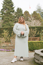 Load image into Gallery viewer, Plus size model wearing long, wide sleeve dress in sage green